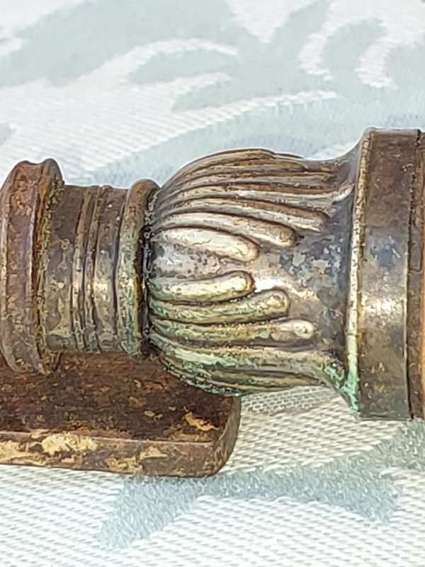 AN ANTIQUE ROAST FORK SOLD AS IS