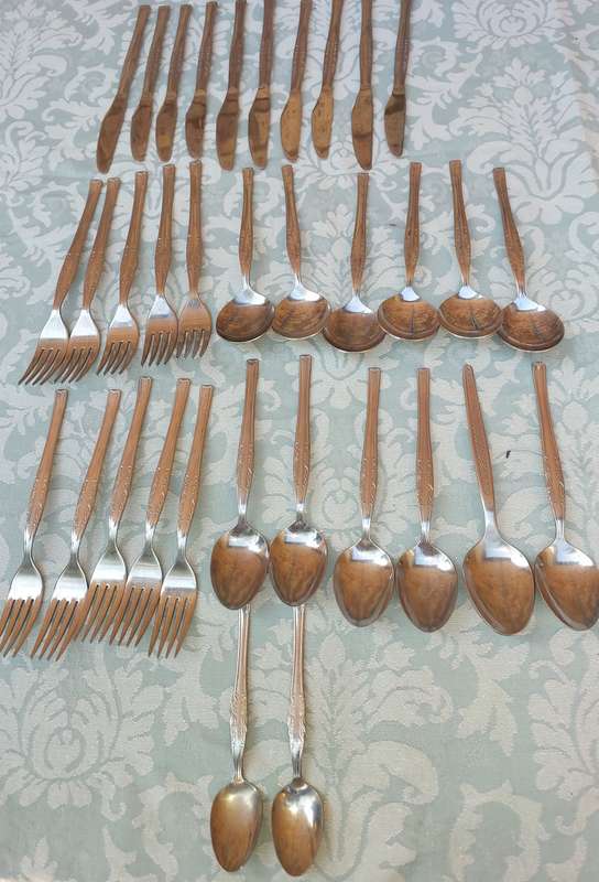 A 34-PIECE ALFA STAINLESS STEEL CUTLERY SET