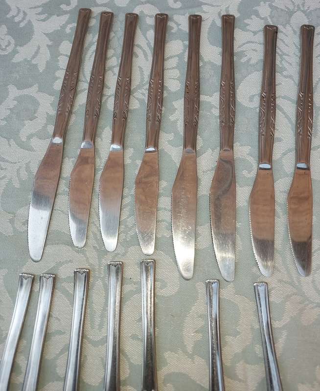 A 34-PIECE ALFA STAINLESS STEEL CUTLERY SET
