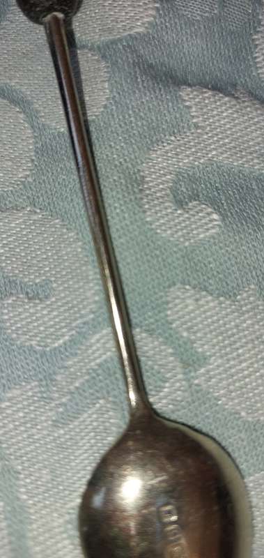 A VINTAGE SET OF COFFEE BEAN TEASPOONS SOLD AS IS