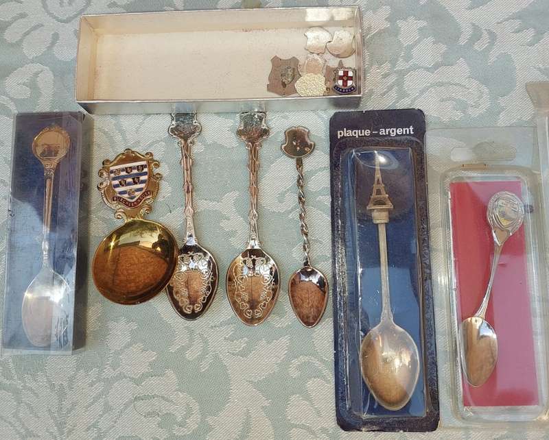 A COLLECTION OF MEMORABILIA SPOONS