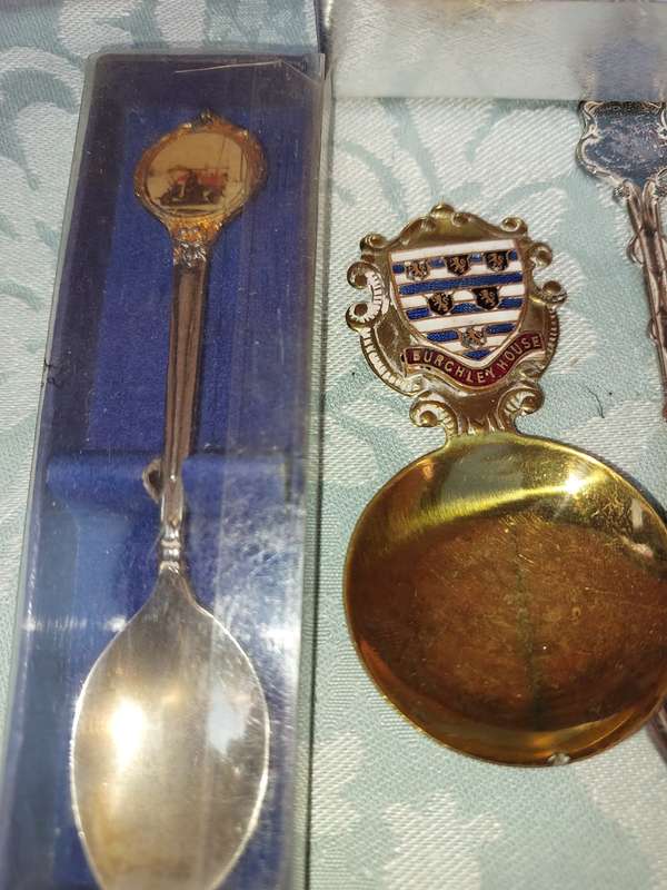 A COLLECTION OF MEMORABILIA SPOONS
