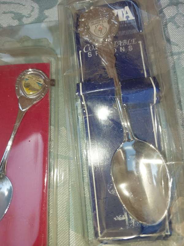 A COLLECTION OF MEMORABILIA SPOONS