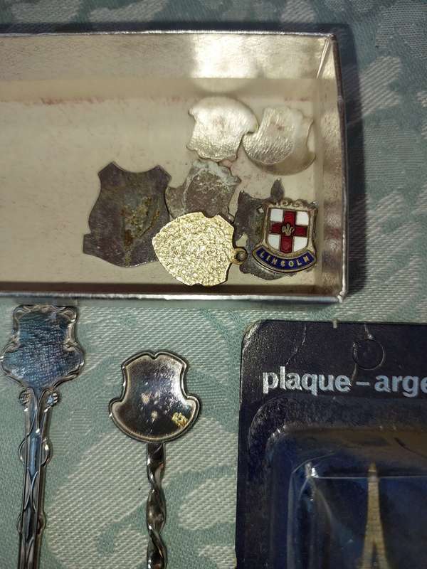 A COLLECTION OF MEMORABILIA SPOONS