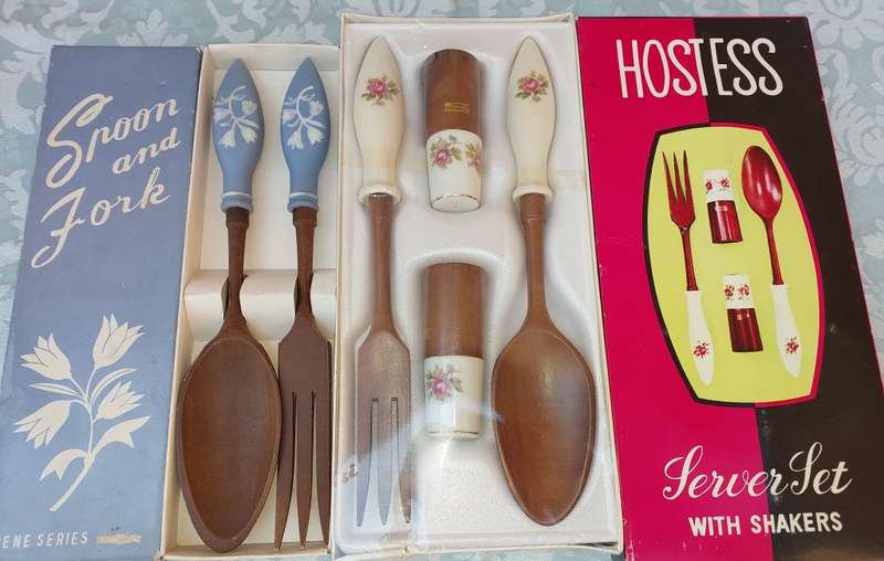 TWO ORNATE SETS OF CUTLERY MADE FROM WOOD