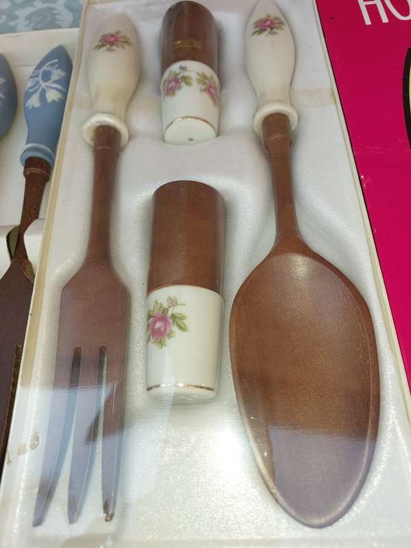 TWO ORNATE SETS OF CUTLERY MADE FROM WOOD
