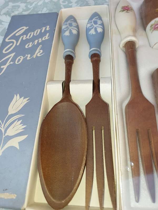 TWO ORNATE SETS OF CUTLERY MADE FROM WOOD