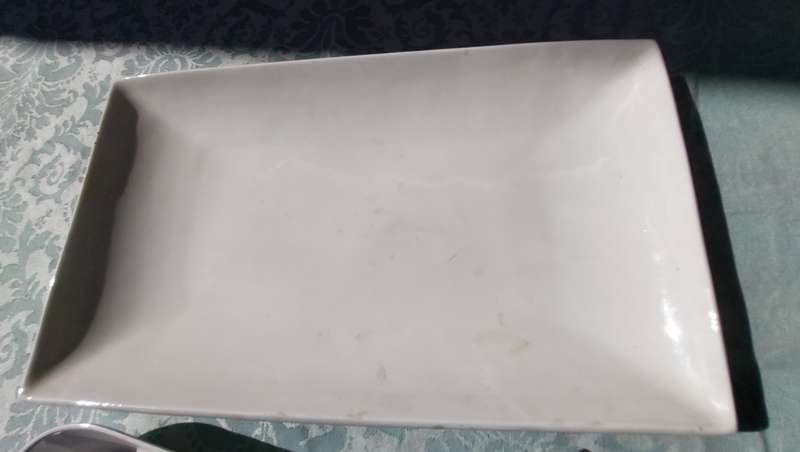 A COLLECTION OF THREE ART DECOR PORCELAIN PLATTERS