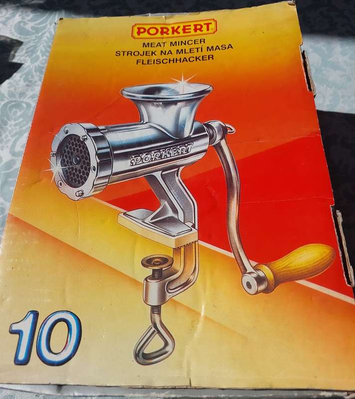A VINTAGE PORKERT MEAT MINCER NUMBER #10 SOLD AS IS