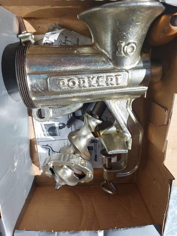 A VINTAGE PORKERT MEAT MINCER NUMBER #10 SOLD AS IS