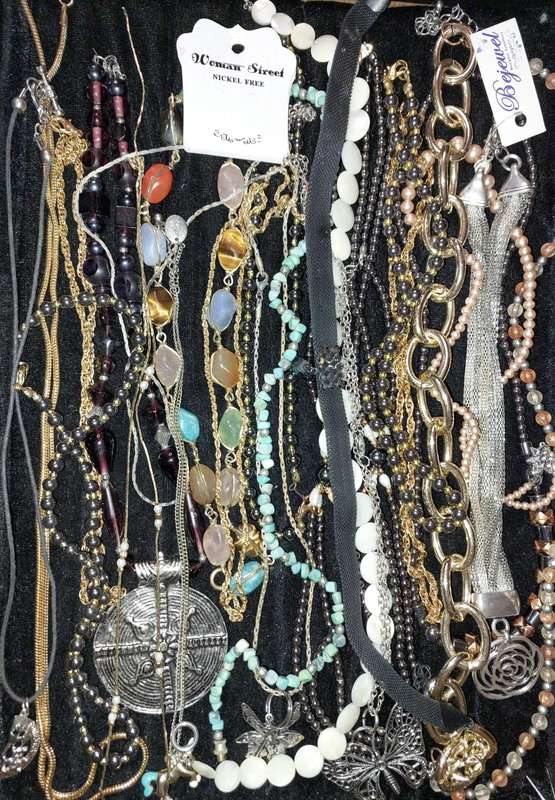 A COLLECTION OF DESIGNER COSTUME NECKLACES USED SOLD AS IS