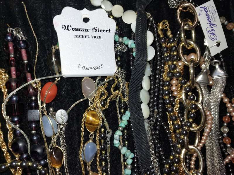 A COLLECTION OF DESIGNER COSTUME NECKLACES USED SOLD AS IS