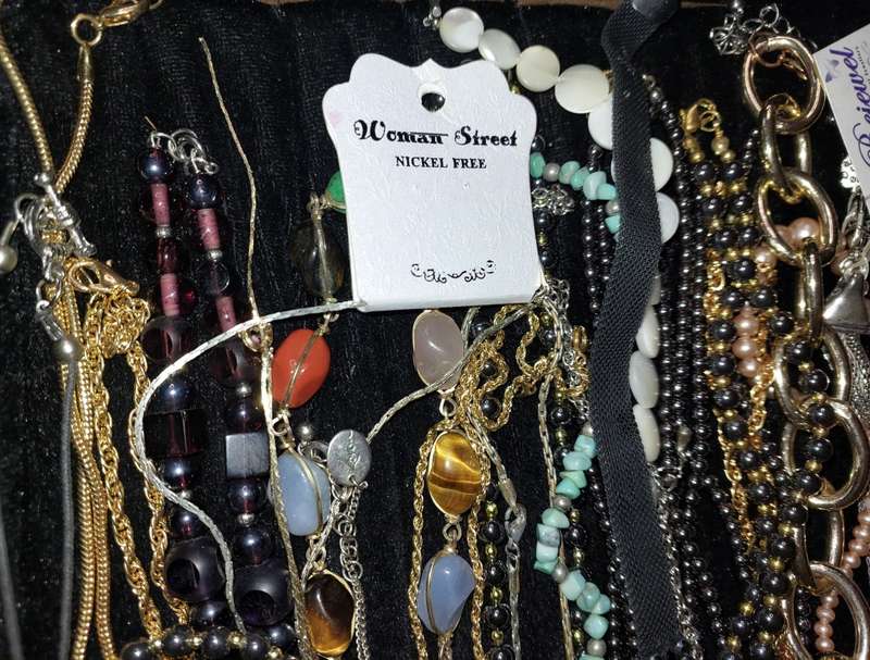 A COLLECTION OF DESIGNER COSTUME NECKLACES USED SOLD AS IS