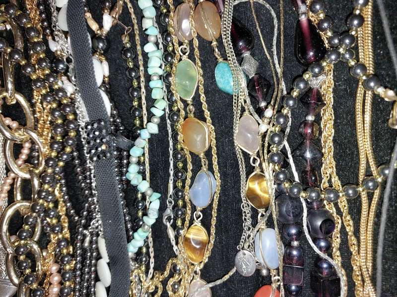 A COLLECTION OF DESIGNER COSTUME NECKLACES USED SOLD AS IS