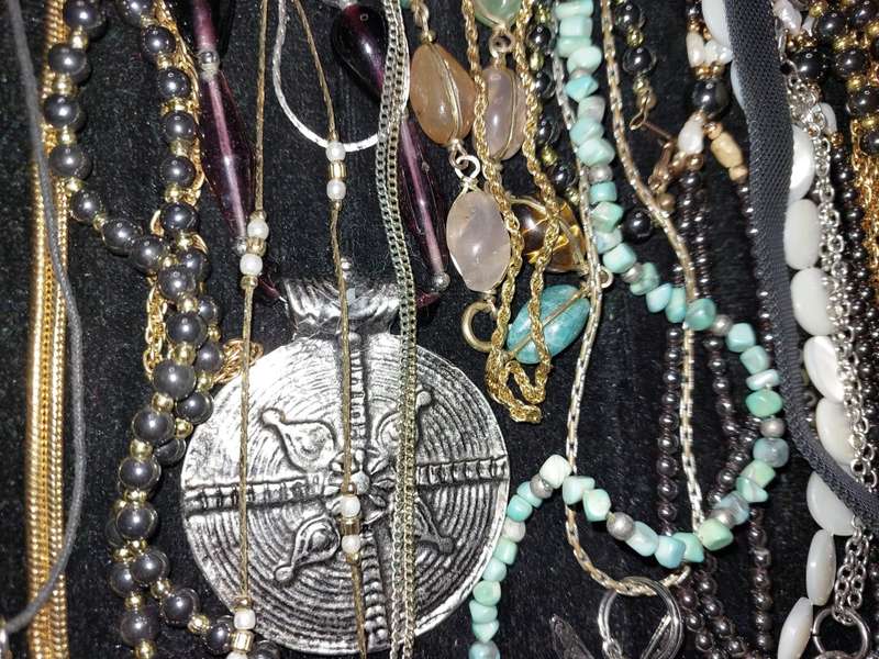 A COLLECTION OF DESIGNER COSTUME NECKLACES USED SOLD AS IS