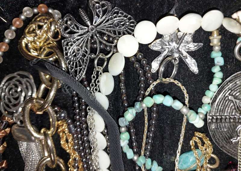 A COLLECTION OF DESIGNER COSTUME NECKLACES USED SOLD AS IS