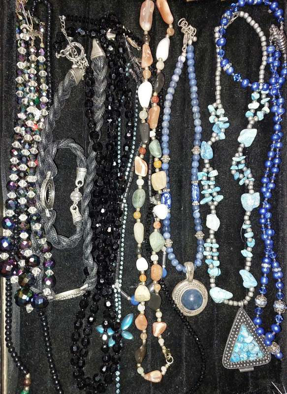 A COLLECTION OF DESIGNER COSTUME NECKLACES USED SOLD AS IS