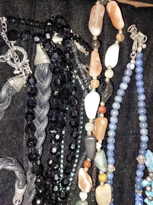 A COLLECTION OF DESIGNER COSTUME NECKLACES USED SOLD AS IS