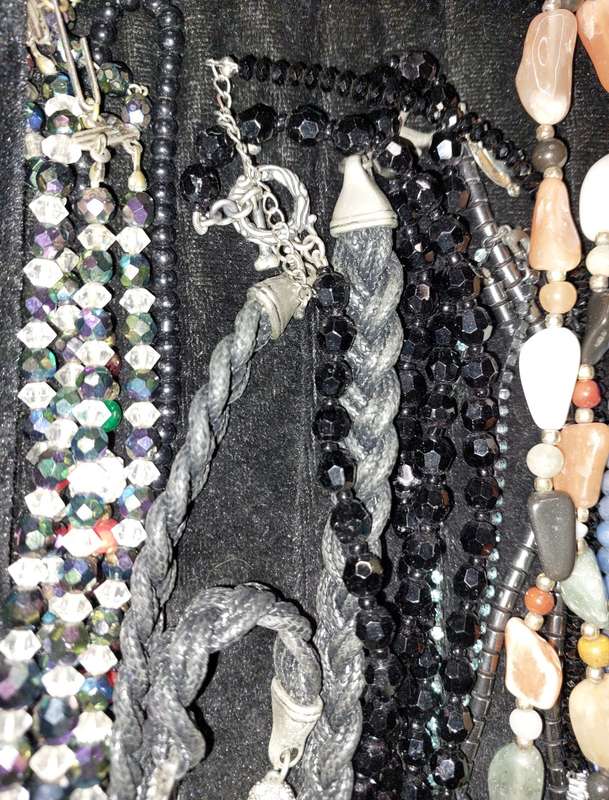 A COLLECTION OF DESIGNER COSTUME NECKLACES USED SOLD AS IS