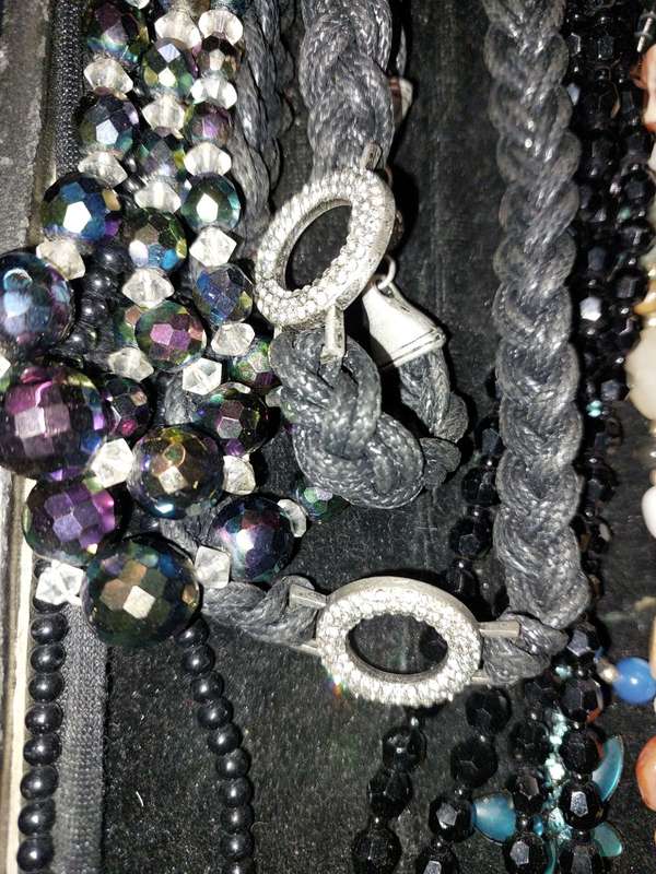 A COLLECTION OF DESIGNER COSTUME NECKLACES USED SOLD AS IS