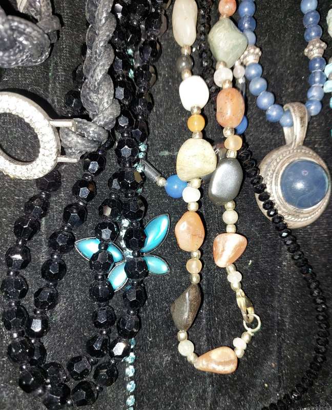 A COLLECTION OF DESIGNER COSTUME NECKLACES USED SOLD AS IS