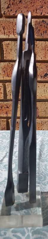 AN ART DECOR LITTLE IRON PEOPLE SCULPTURE