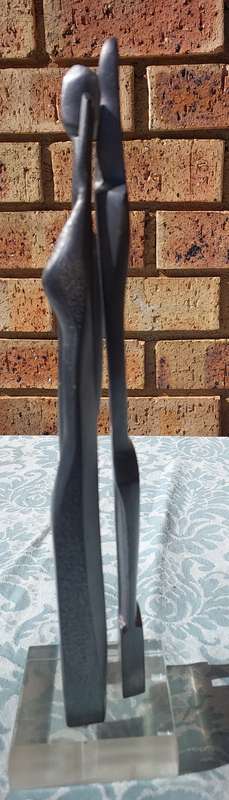 AN ART DECOR LITTLE IRON PEOPLE SCULPTURE