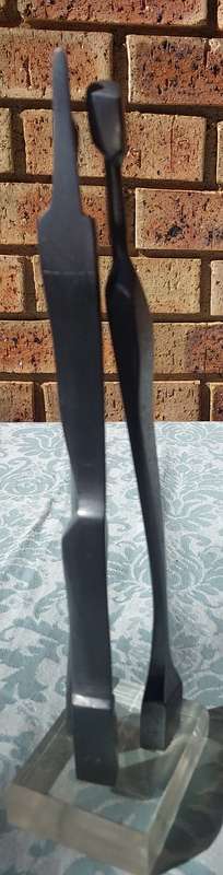 AN ART DECOR LITTLE IRON PEOPLE SCULPTURE
