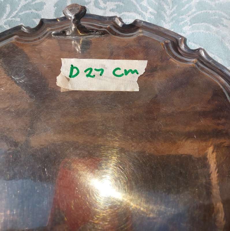 A 27 CENTIMETER DIAMETER VICTORIAN EPNS SERVING TRAY