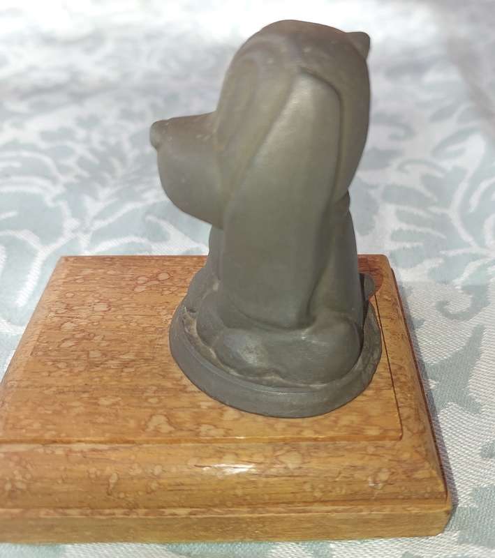A HEAVY BASSET DOG  CAST IRON PAPERWEIGHT WITH A PINE BASE