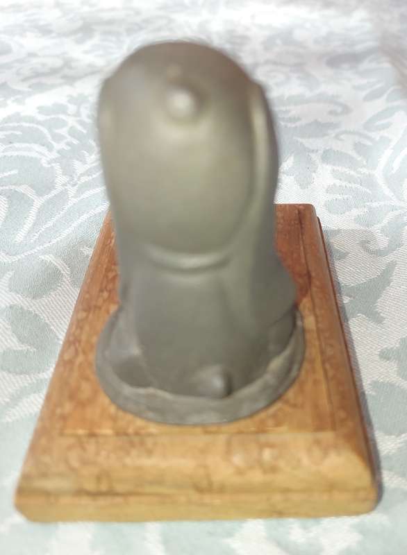 A HEAVY BASSET DOG  CAST IRON PAPERWEIGHT WITH A PINE BASE