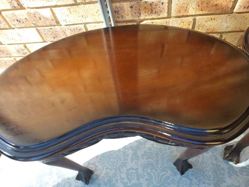 AN ANTIQUE PAIR OF KIDNEY-SHAPED BALL N CLAW-LEGGED OCCASIONAL TABLES