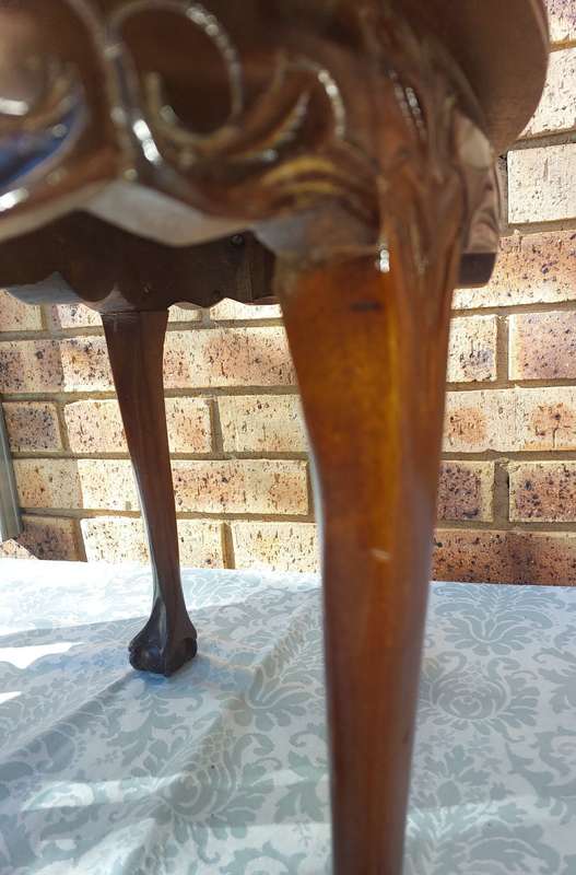 AN ANTIQUE PAIR OF KIDNEY-SHAPED BALL N CLAW-LEGGED OCCASIONAL TABLES