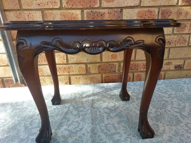 AN ANTIQUE RECTANGULAR SOLID WOOD BALL N CLAW LEGGED OCCASIONAL TABLE