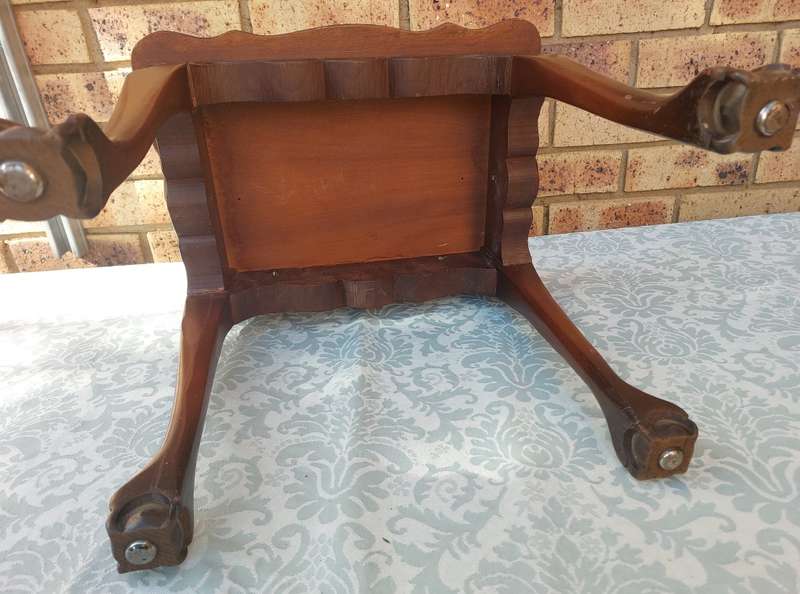 AN ANTIQUE RECTANGULAR SOLID WOOD BALL N CLAW LEGGED OCCASIONAL TABLE