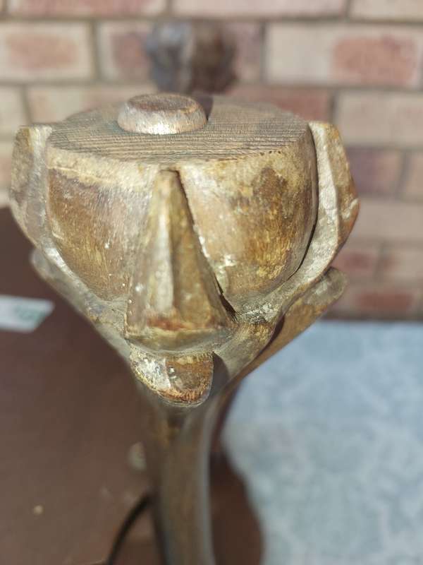 AN ANTIQUE SOLID WOOD TWO TEAR TEA TABLE WITH BALL N CLAW LEGS