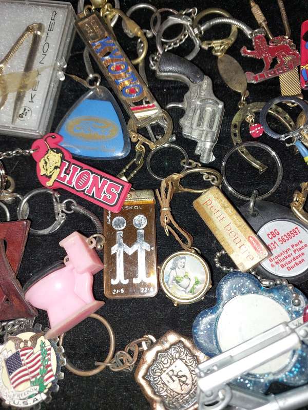 A BULK VINTAGE COLLECTION KEY RINGS SOLD AS IS