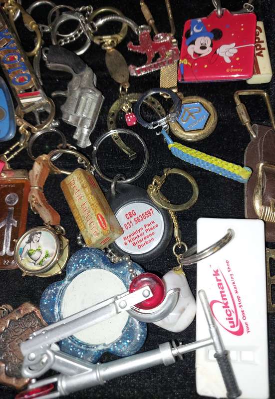 A BULK VINTAGE COLLECTION KEY RINGS SOLD AS IS