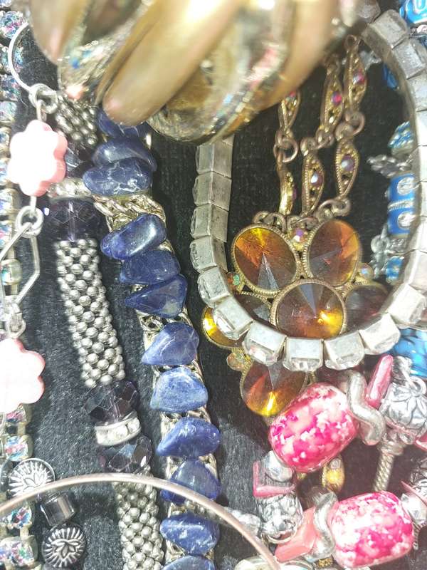 A VINTAGE USED JOB LOT COLLECTION BRACELETS AND BANGLES