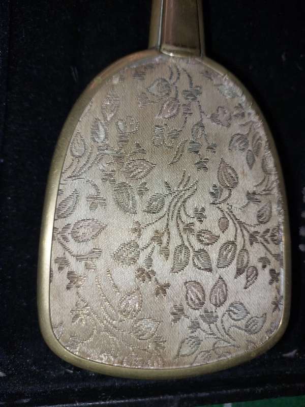 AN ANTIQUE COLLECTION EDWARDIAN BRASS GOLD PLATED HAIR BRUSHES