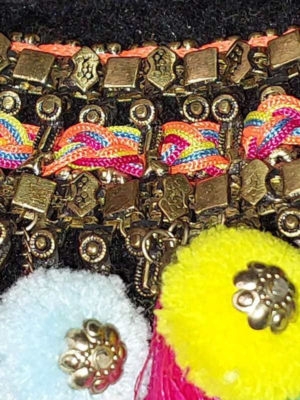 AN ETHNIC BRASS COLLAR NECKLACE SOLD AS IS