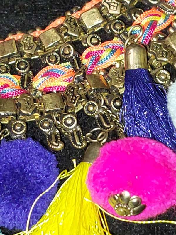 AN ETHNIC BRASS COLLAR NECKLACE SOLD AS IS