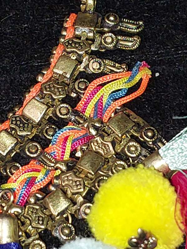 AN ETHNIC BRASS COLLAR NECKLACE SOLD AS IS