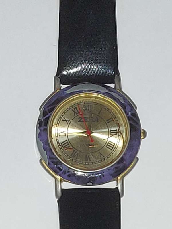 A USED ZEBA QUARTZ WRIST WATCH SOLD AS IS UNTESTED