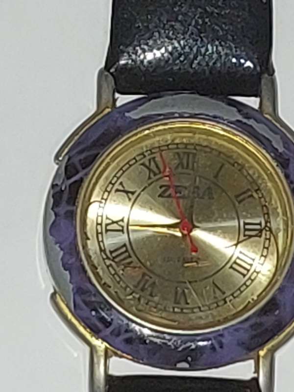 A USED ZEBA QUARTZ WRIST WATCH SOLD AS IS UNTESTED