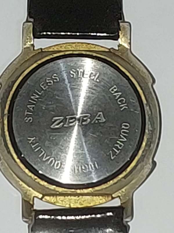 A USED ZEBA QUARTZ WRIST WATCH SOLD AS IS UNTESTED