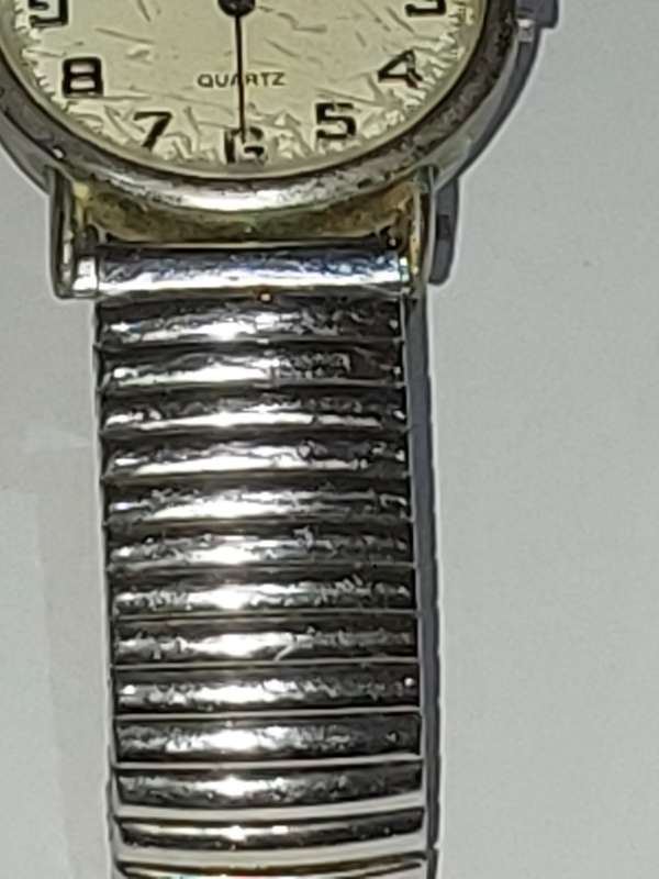 AN OSIROCK QUARTZ WRIST WATCH
