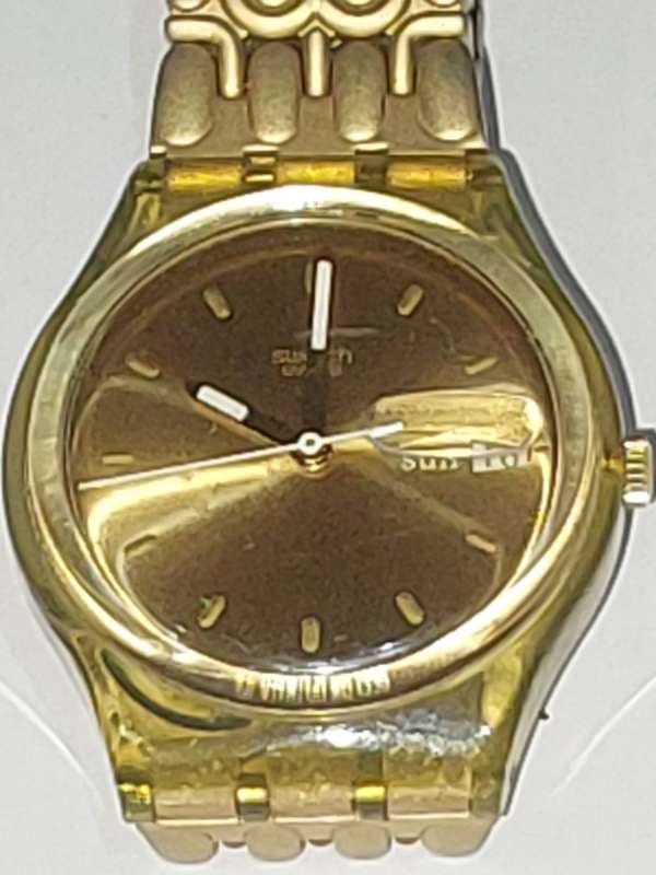 A VINTAGE SWATCH DATE GOLDPLATED 9003
