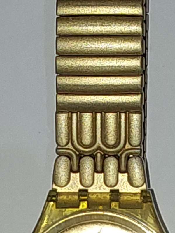 A VINTAGE SWATCH DATE GOLDPLATED 9003