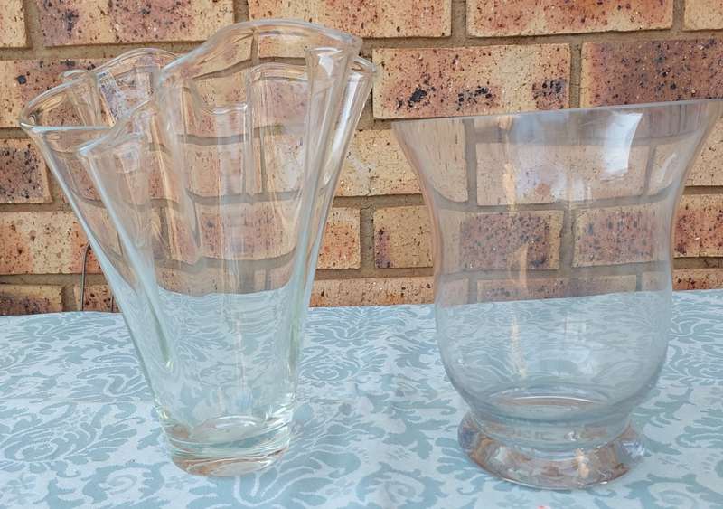 Two ornate glass vases sold